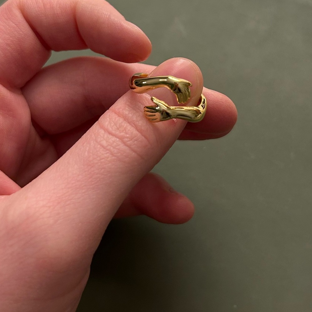 Hand Hugging Ring